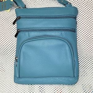 Light blue cowhide leathder crossbody purse.
